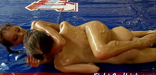  Oiledup babe fingered by wrestling opponent